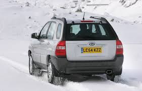 Kia Sportage 2 2008 MkII greay rear view in snow