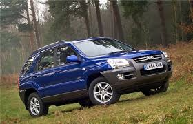 Kia Sportage 3 2008 MkII Blue forest driving