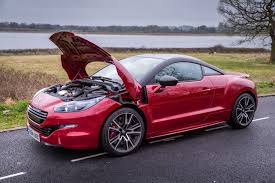 Peugeot RCZ-R Red side view with bonnet open